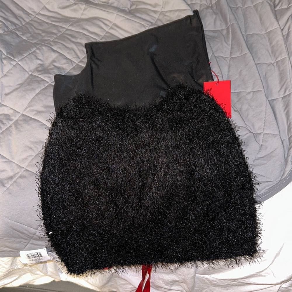 Two piece set (ruffled skirt with crossbody body suit)